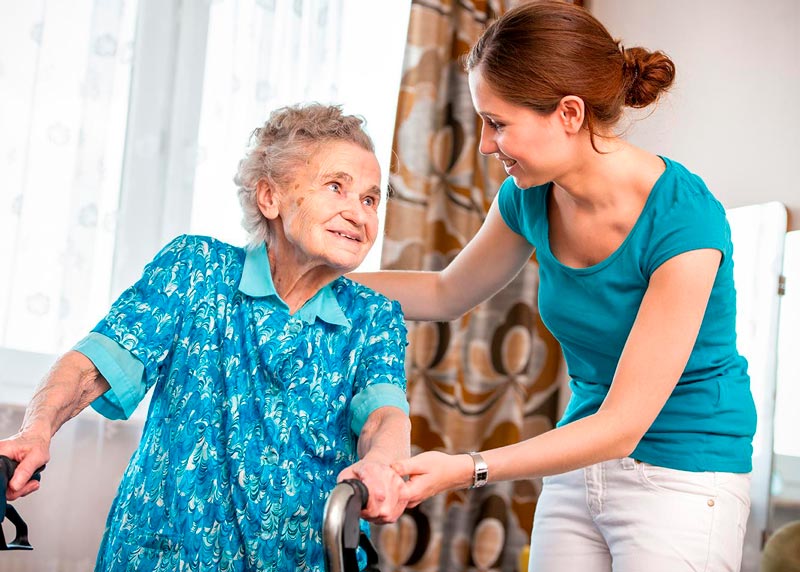 A caring moment with an older adult in a comfortable home setting