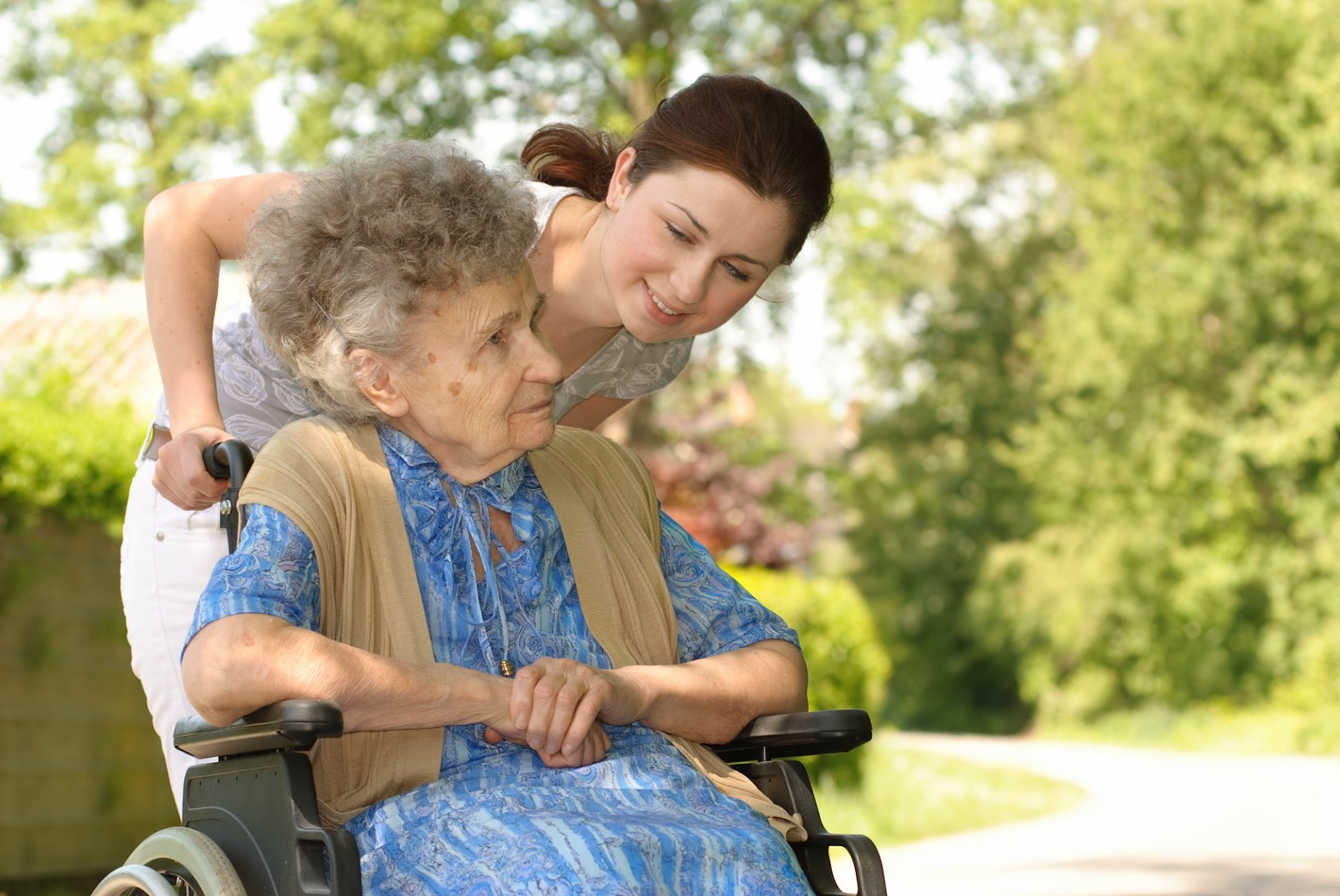 An older adult enjoying a warm residential care setting